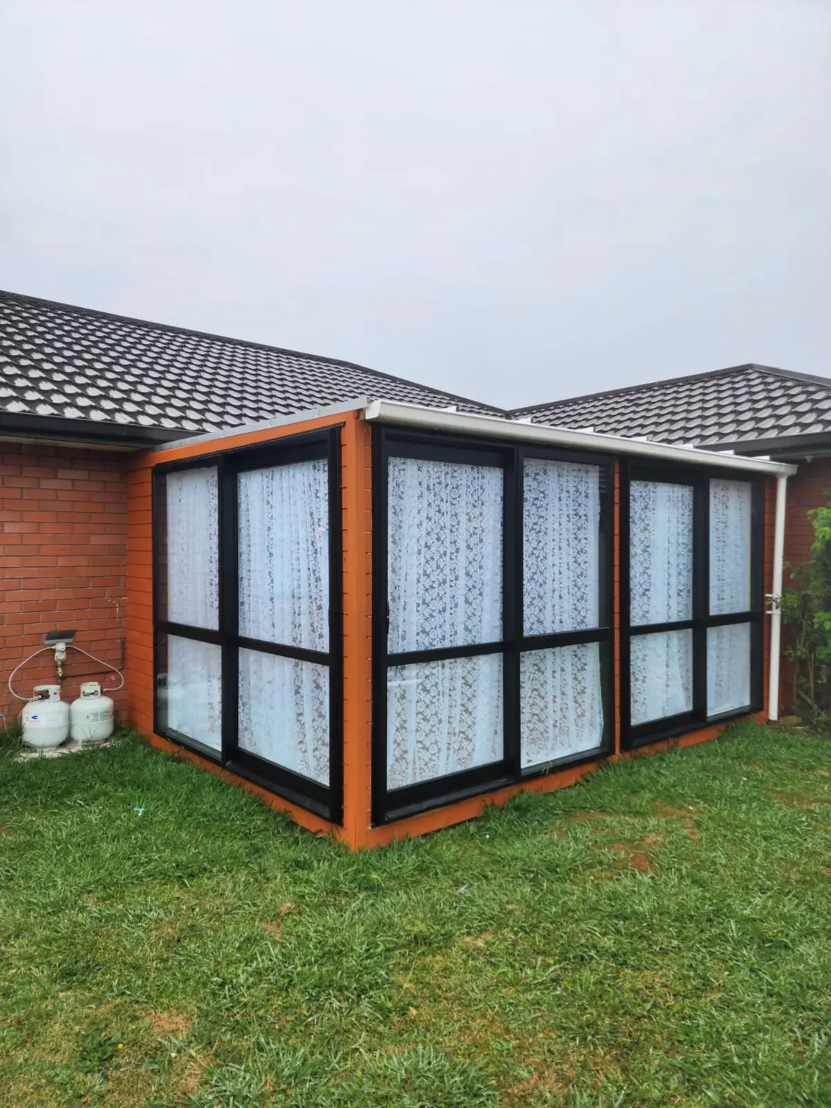 Garden landscaping with stone pathway and lush greenery